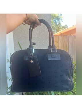 MCM Black Monogram travel bag with hang tag no strap -100% authentic